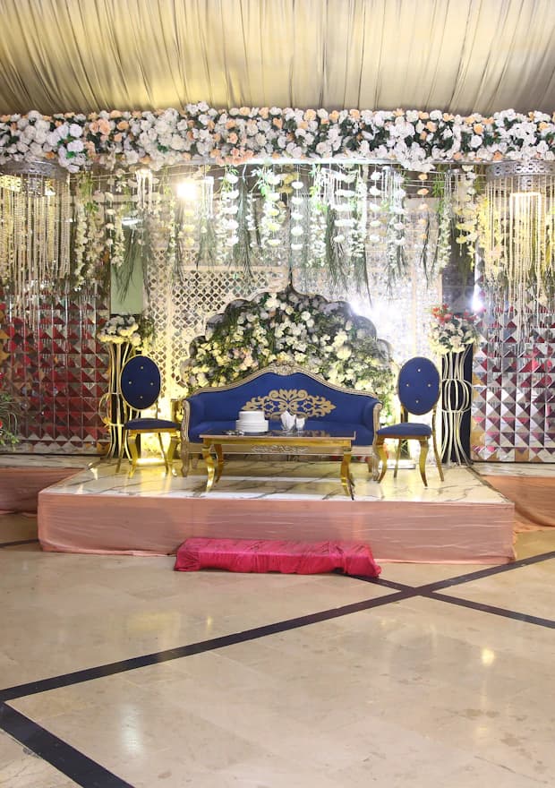 Decorated marquee stage at a Pakistani wedding venue